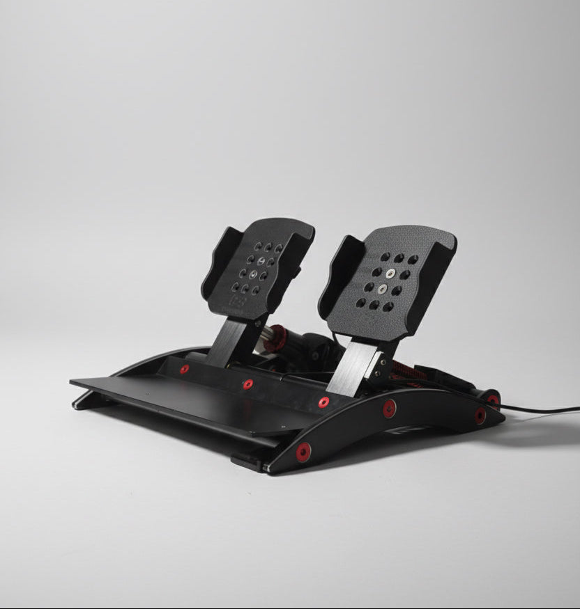 Gaming steering wheel and pedals on a gray background