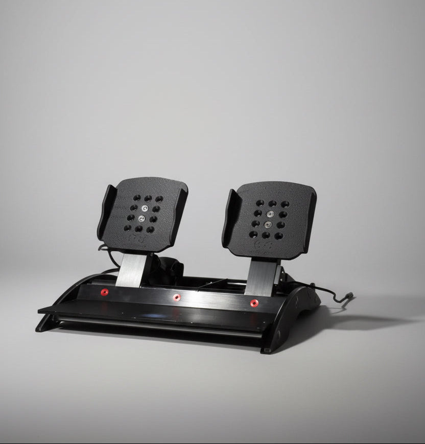 Black gaming pedal set on a gray background