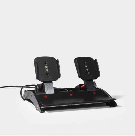 Black flight simulator pedal set on a white background